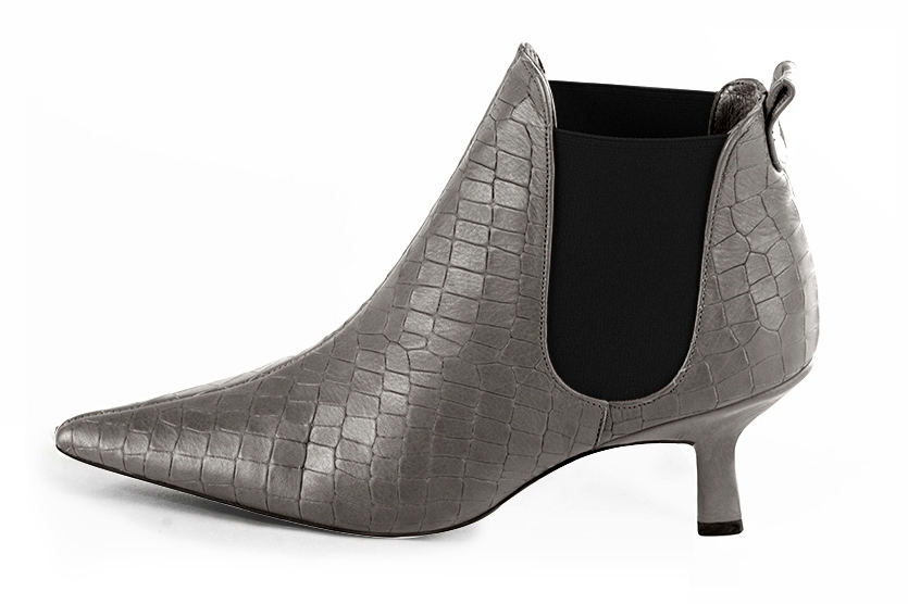 French elegance and refinement for these ash grey and matt black dress booties, with elastics on the sides, 
                available in many subtle leather and colour combinations. This pretty feminine bootie will do you a lot of good throughout the seasons.
Easy to put on with its elastic bands, it has everything to seduce you.
Personalise it or not, with your own colours on the "My favourites" page.  
                Matching clutches for parties, ceremonies and weddings.   
                You can customize these ankle boots with elastics to perfectly match your tastes or needs, and have a unique model.  
                Choice of leathers, colours, knots and heels. 
                Wide range of materials and shades carefully chosen.  
                Rich collection of flat, low, mid and high heels.  
                Small and large shoe sizes - Florence KOOIJMAN